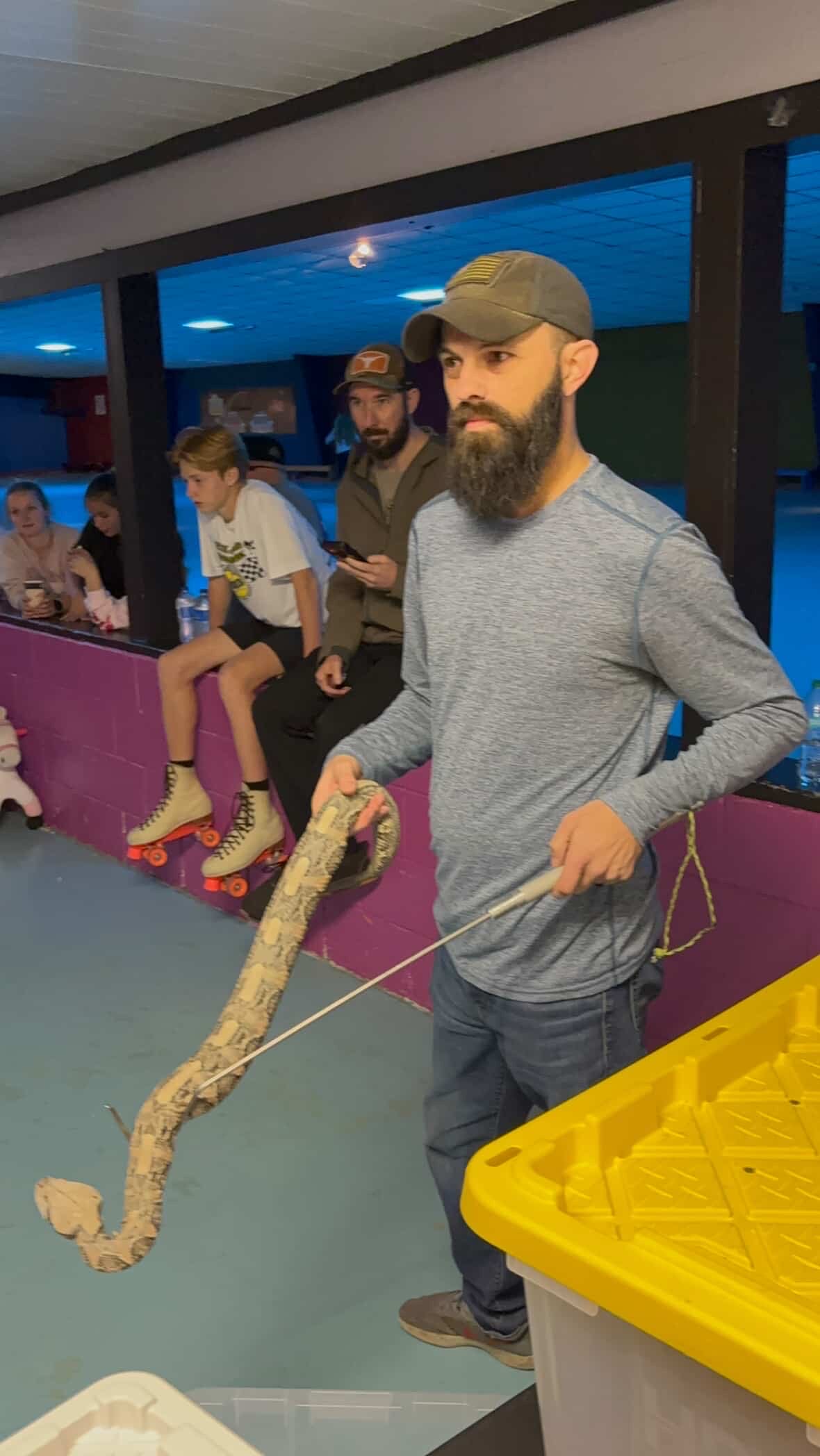 Brandon with the gaboon viper, the animal he is learning with